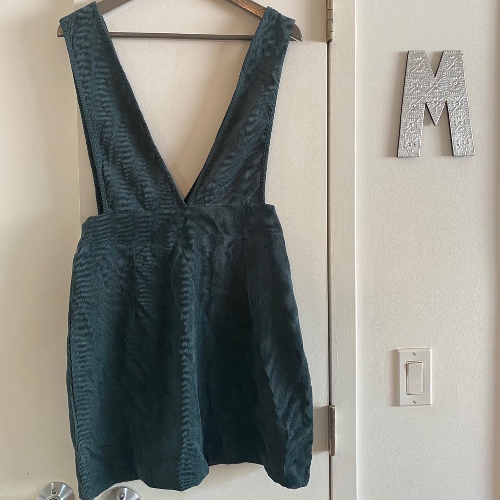 Dark green overall dress. Medium